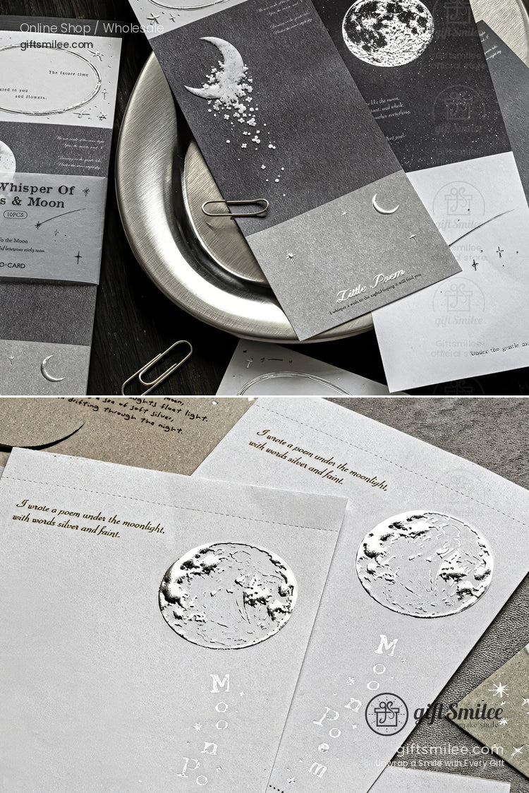 Moon-themed embossed stationery set with silver foil accents and celestial bookmarks on desk props, perfect for journaling or gift notes.