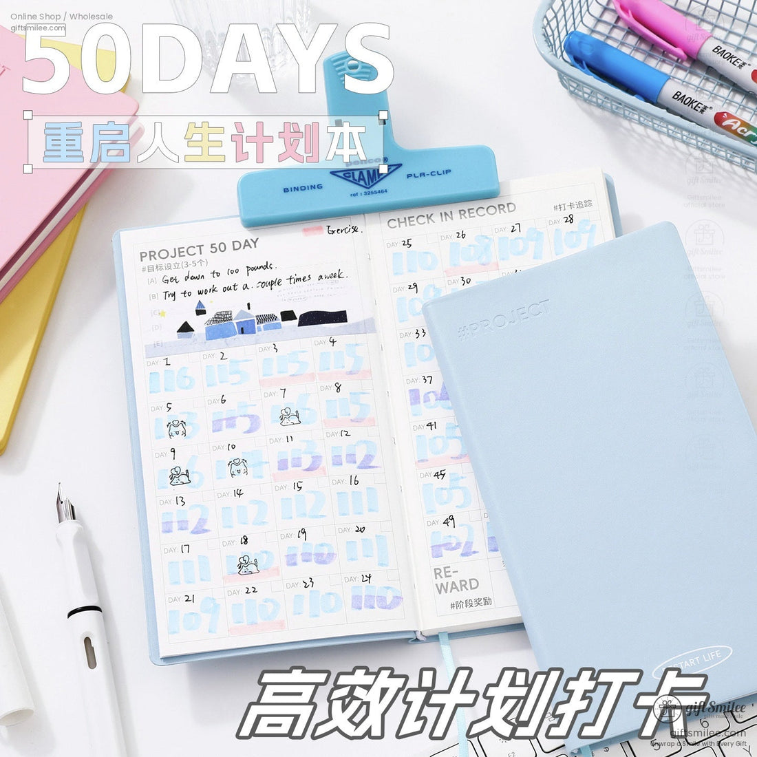 50-day planner notebook set on desk with open habit tracker and light blue cover, ideal for productivity and scheduling in Shopify stationery collection