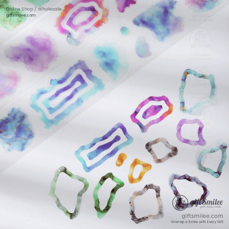 Vibrant watercolor washi tape rolls with abstract patterns, perfect for crafts