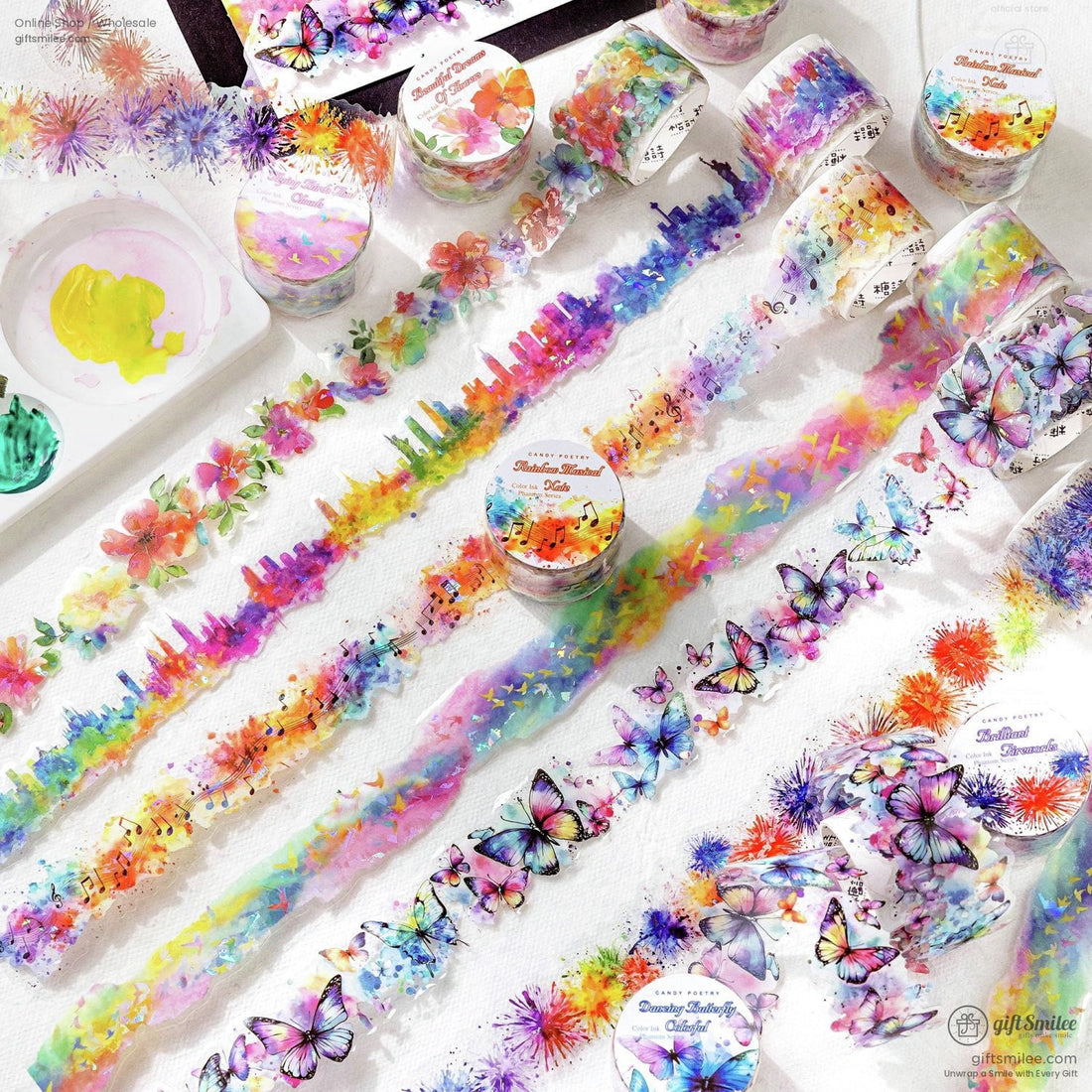 Rainbow watercolor washi tape set with floral, butterfly, skyline, and music note designs for scrapbooking and journaling