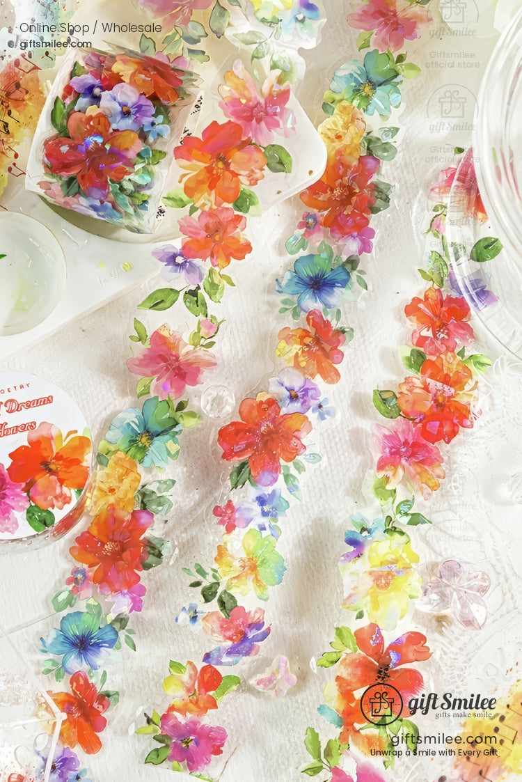 Colorful floral washi tape roll with watercolor-style flowers for scrapbooking and journaling crafts.