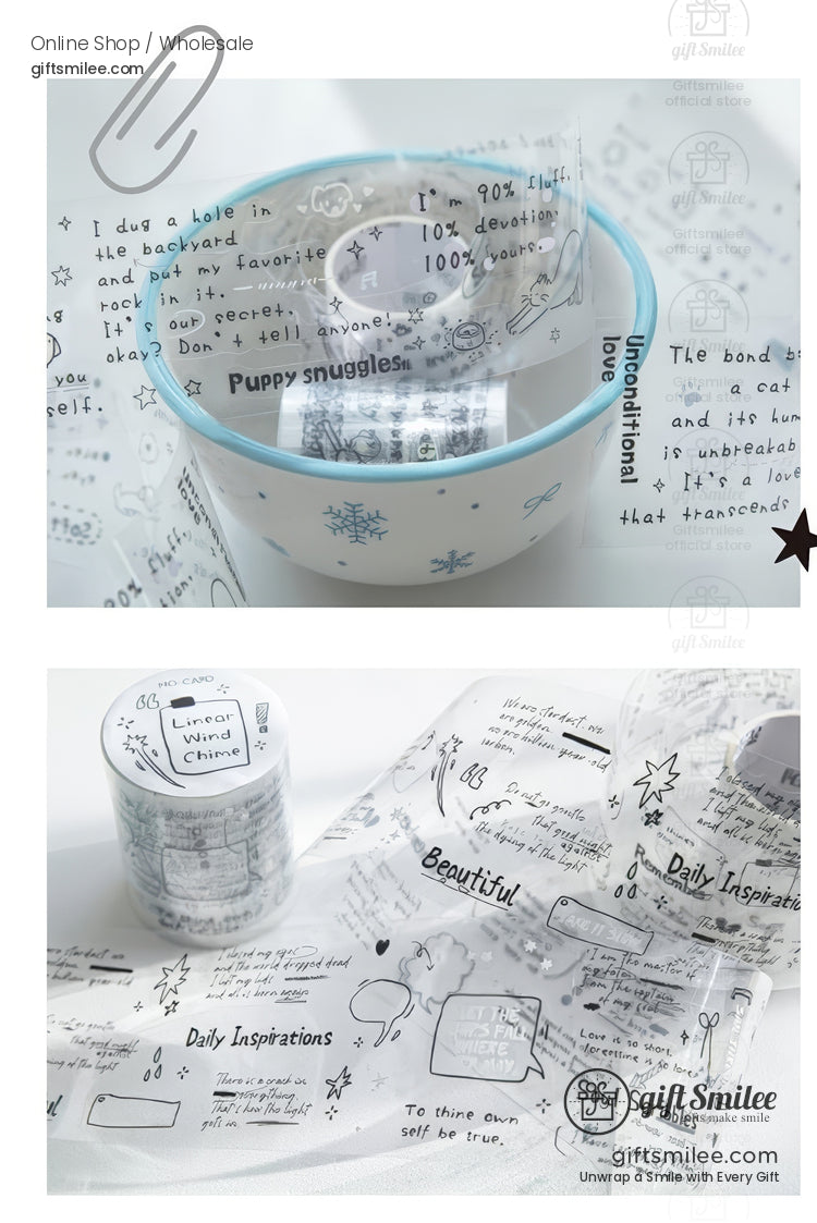 Clear decorative washi tape with hand-drawn doodles and inspirational text, styled over a white bowl with blue snowflakes, for stationery and gift wrapping.