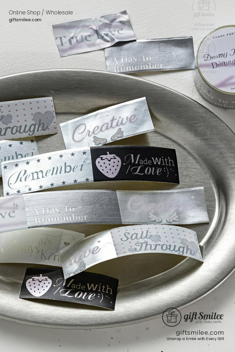 Silver foil gift stickers with inspirational phrases and “Made With Love” tags on a metal tray – giftSmilee wholesale.