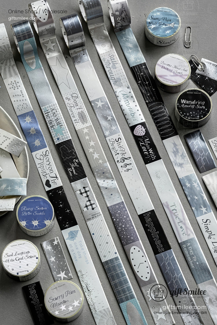 Silver and blue star-themed washi tape set laid out flat for scrapbooking and journaling crafts