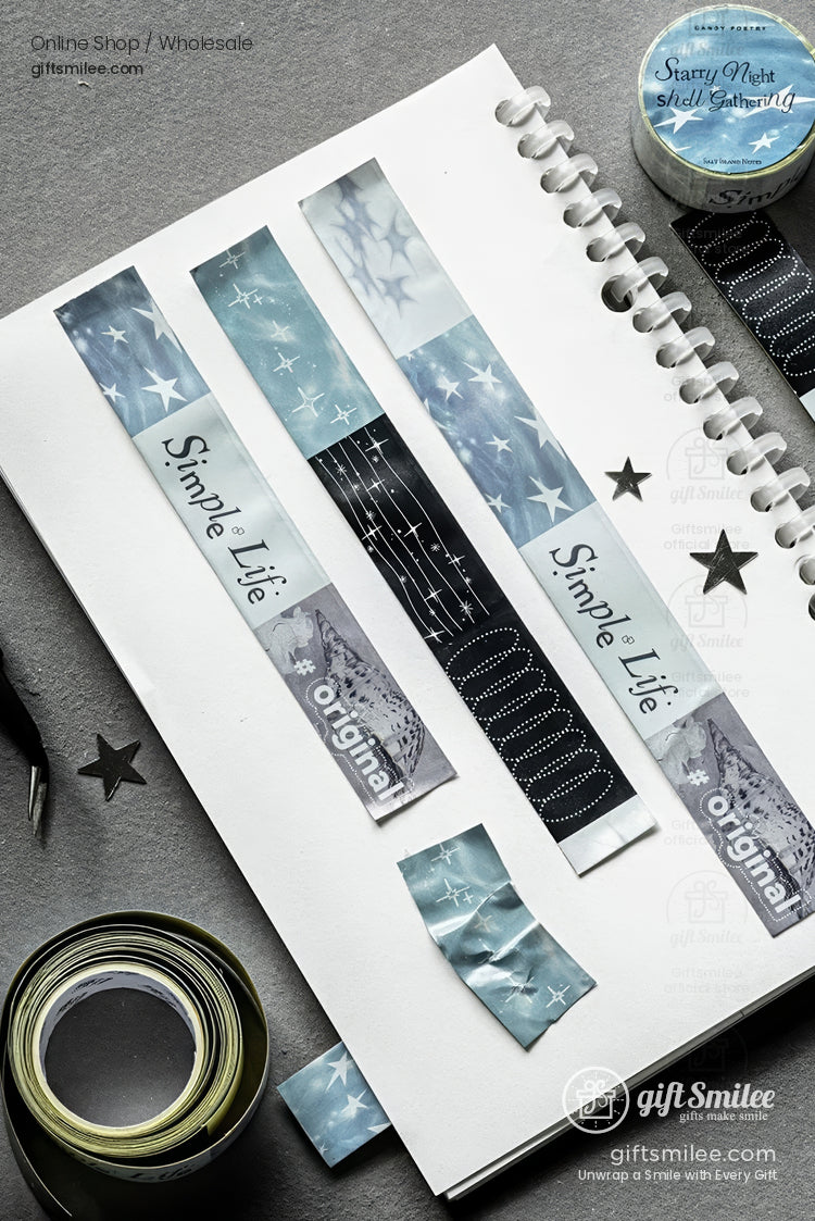 Starry night themed washi tape samples on a sketchbook for scrapbooking and journaling crafts