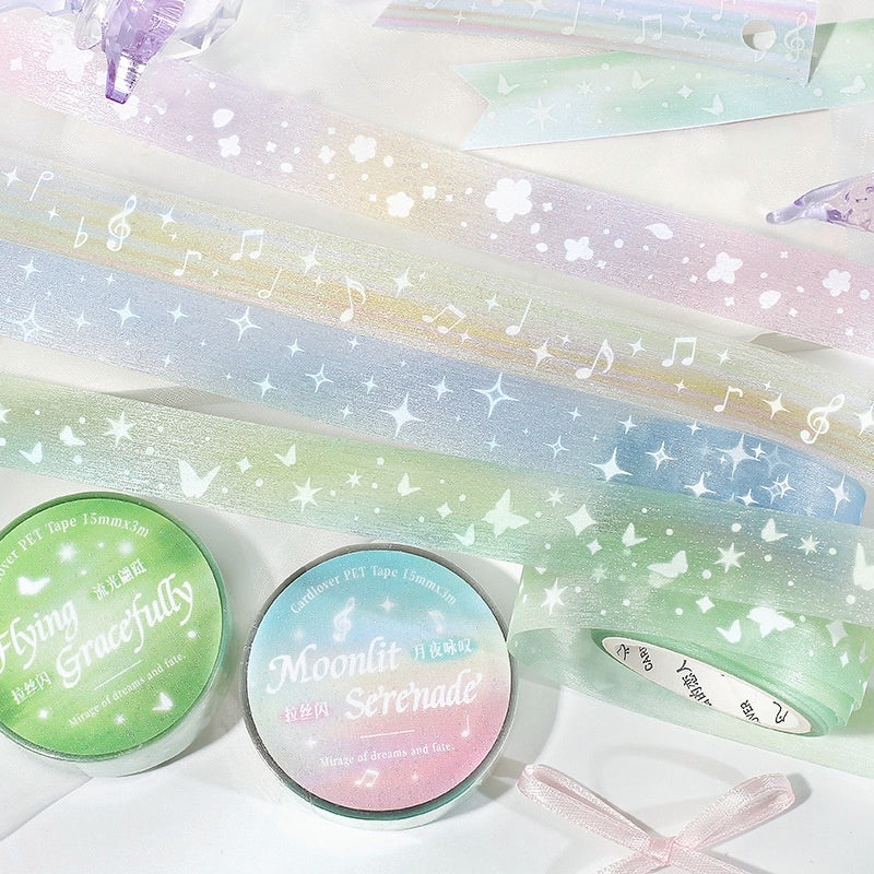 Pastel gradient PET tape with white stars butterflies music notes and floral patterns paired with themed rolls