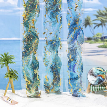 Transparent bookmarks with abstract blue teal and gold foil swirls inspired by ocean waves on a beach backdrop