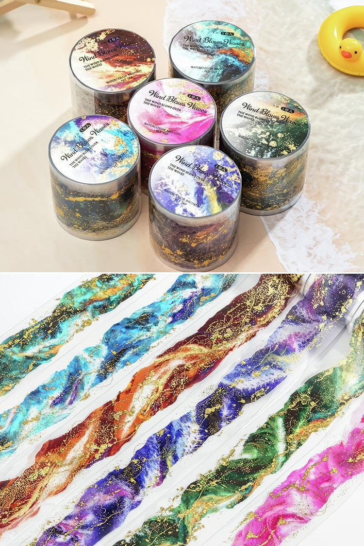 Vibrant marblepatterned washi tapes in goldaccented hues of green blue pink purple and orange in sleek rolls