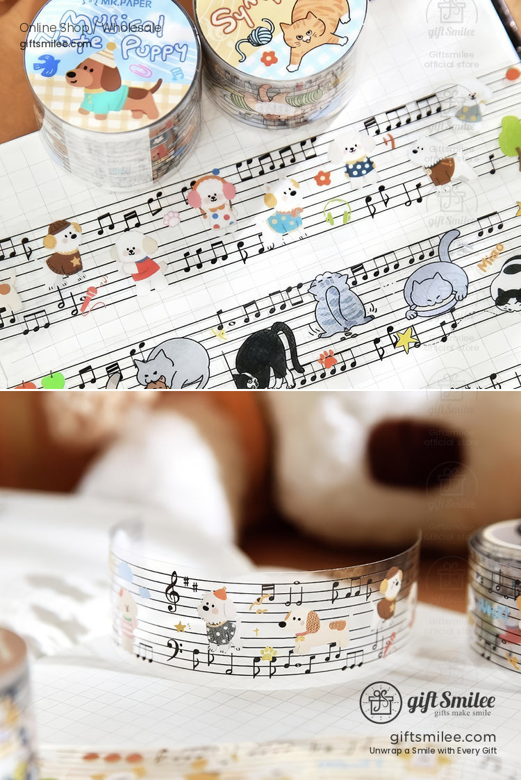 Transparent washi tape with musical notes colorful animal illustrations and playful designs on a white grid notebook