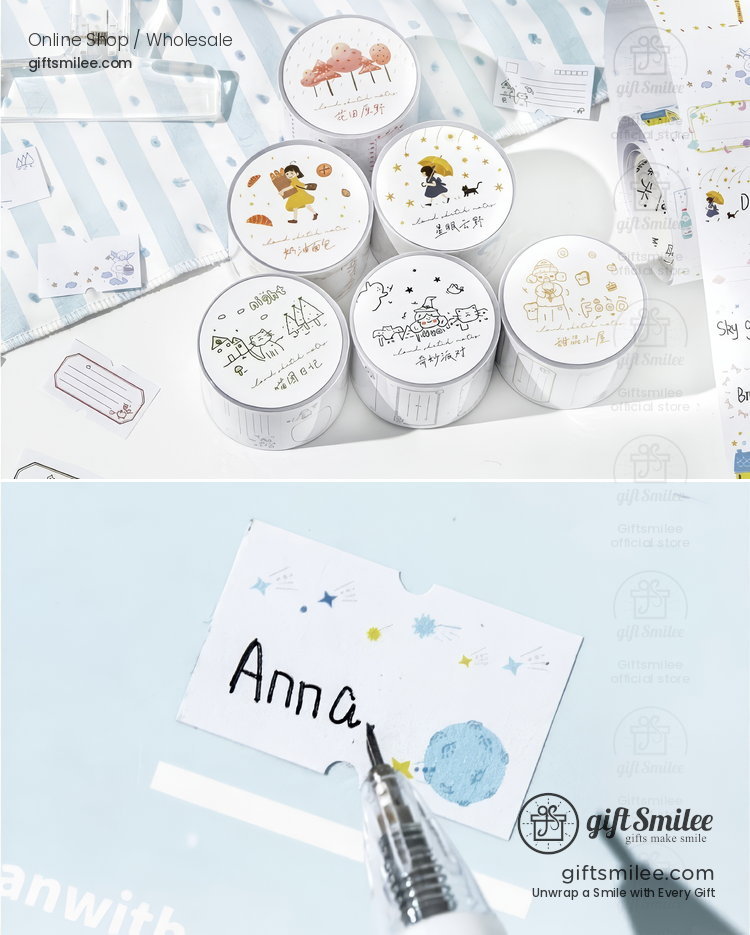 White masking tape rolls with whimsical pastel illustrations and a pen writing Anna on a starry blue notecard