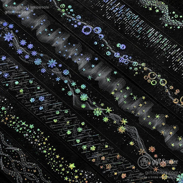 Holographic black washi tapes with iridescent star snowflake and bubble patterns in vibrant green blue and gold