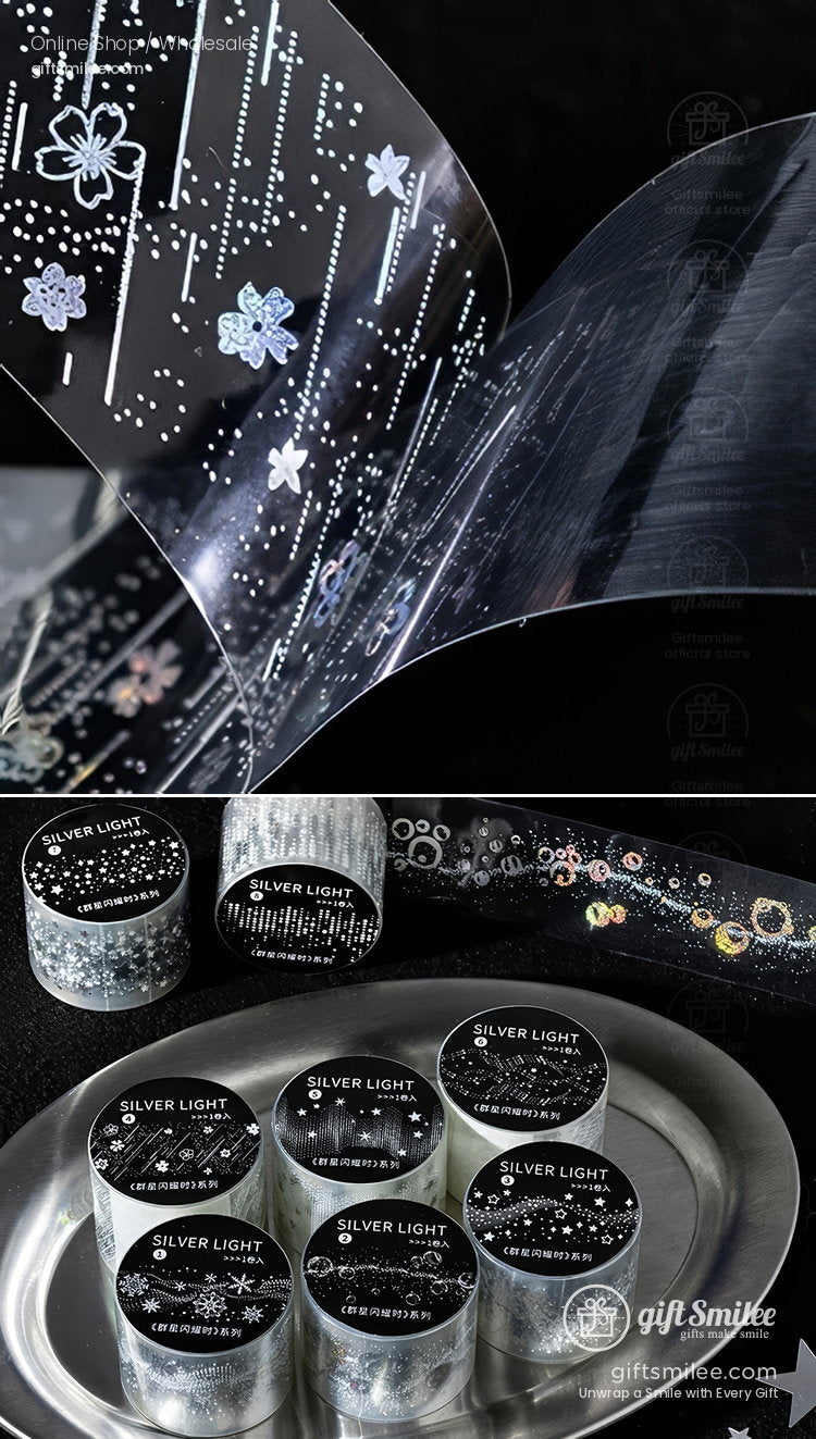 Transparent decorative tape with silver foil floral and star patterns paired with black cylindrical Silver Light containers