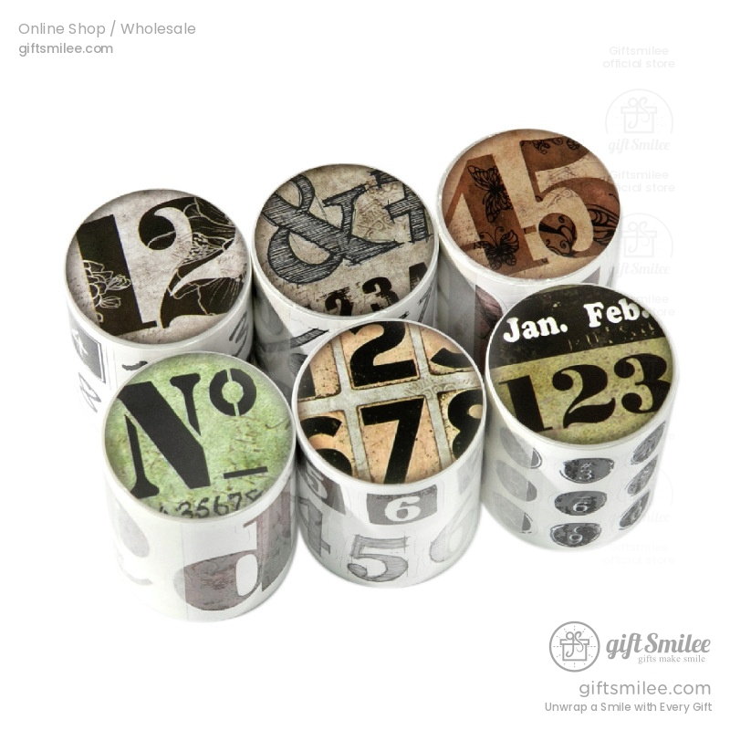 Decorative washi tape set with vintage numbers and letters in black green and sepia tones ideal for crafts