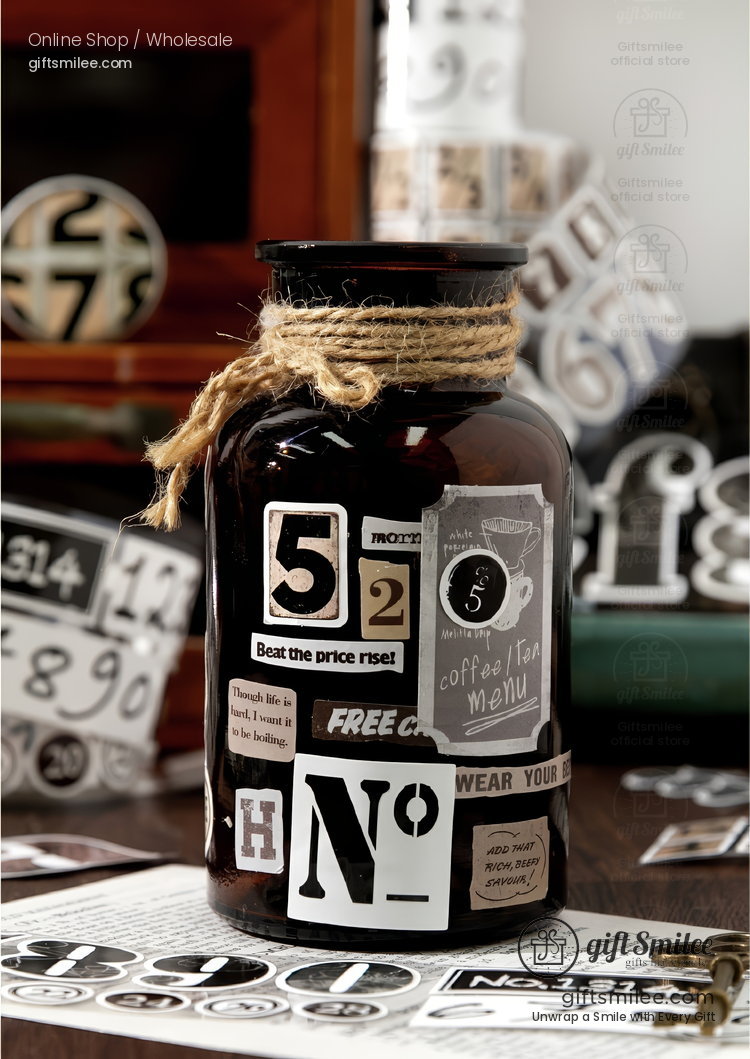 Vintagestyle amber glass jar with eclectic blackandwhite typography stickers tied with rustic jute rope