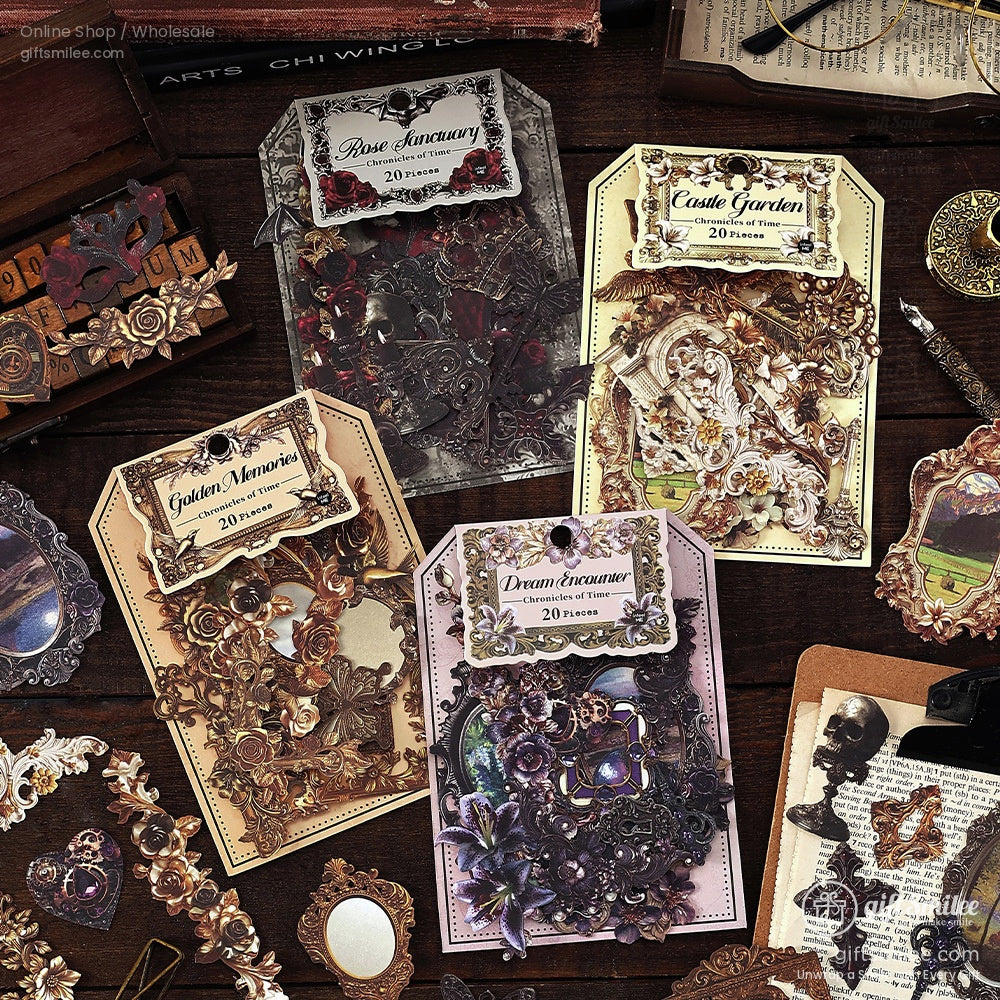 Hand holding ornate Victorian-style vintage frame stickers with floral and gothic designs