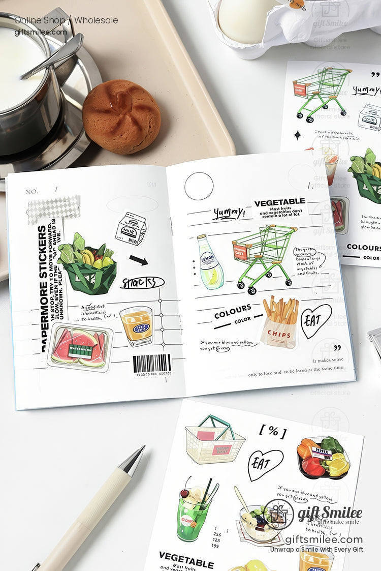 Flat lay of cute grocery-themed planner stickers and stationery, featuring shopping carts, baskets, vegetables, and snacks on open sticker sheets for journaling or scrapbooking.