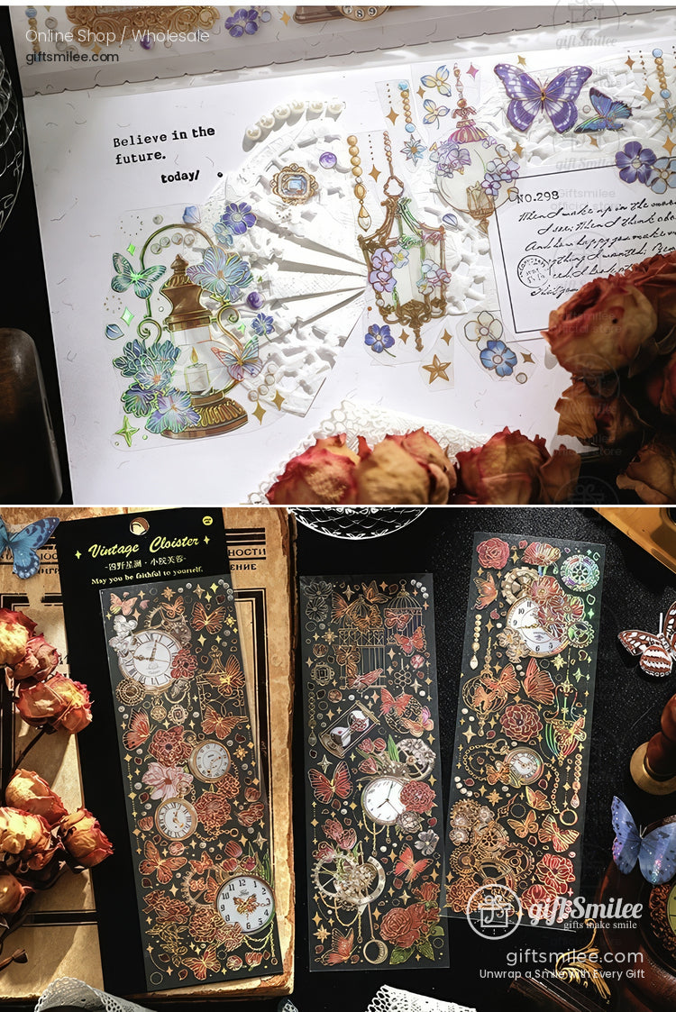 Vintage steampunk-themed decorative stickers and ephemera featuring clocks, gears, butterflies, and floral designs displayed on a craft desk.