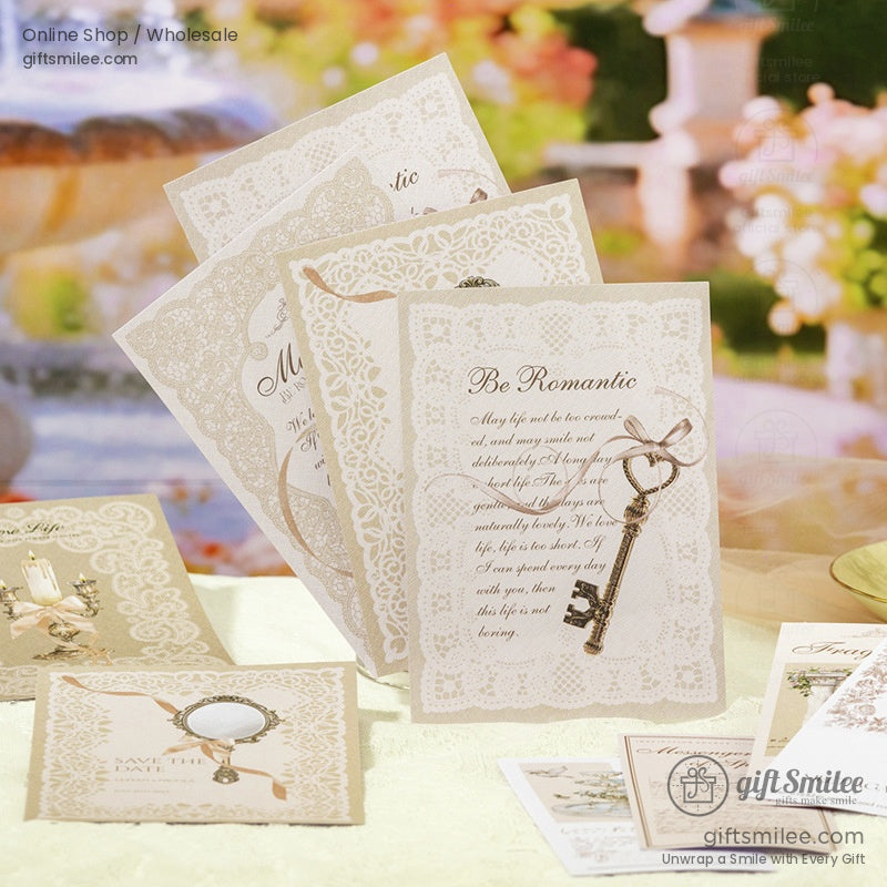 Vintage lace wedding invitation cards with ornate key design and “Be Romantic” text on elegant cream paper, giftsmilee stationery.