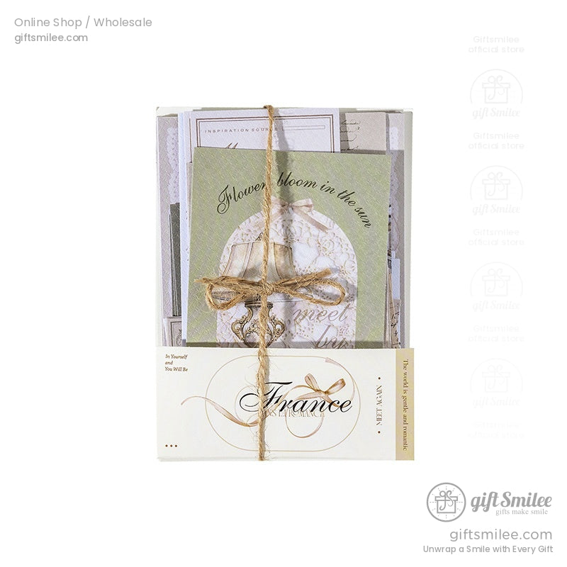 Vintage-style stationery pack tied with jute twine, green and cream “France” themed letter set by Giftsmilee.