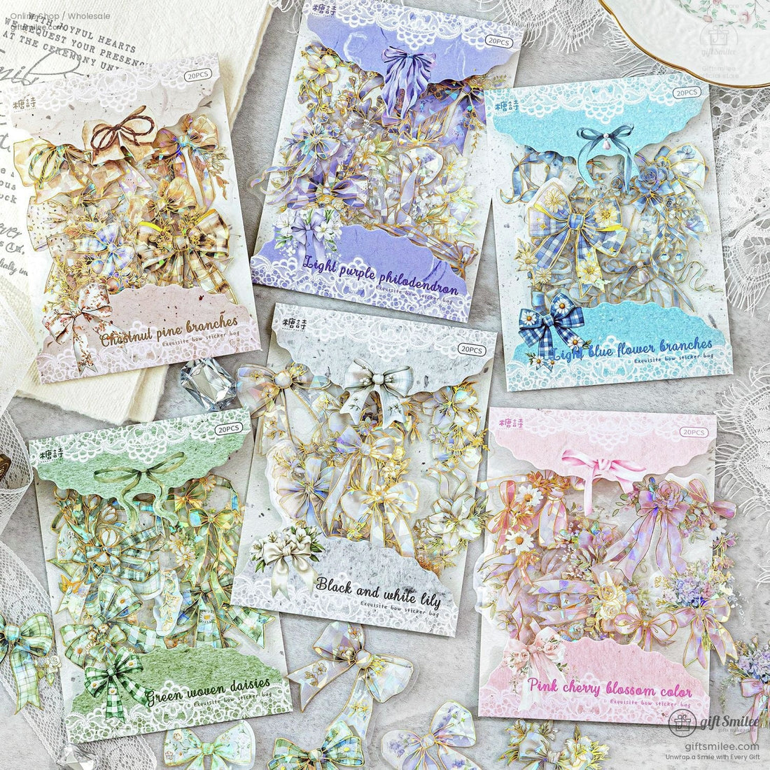 Holographic floral bow sticker with gold foil accents on black background for planners and crafts