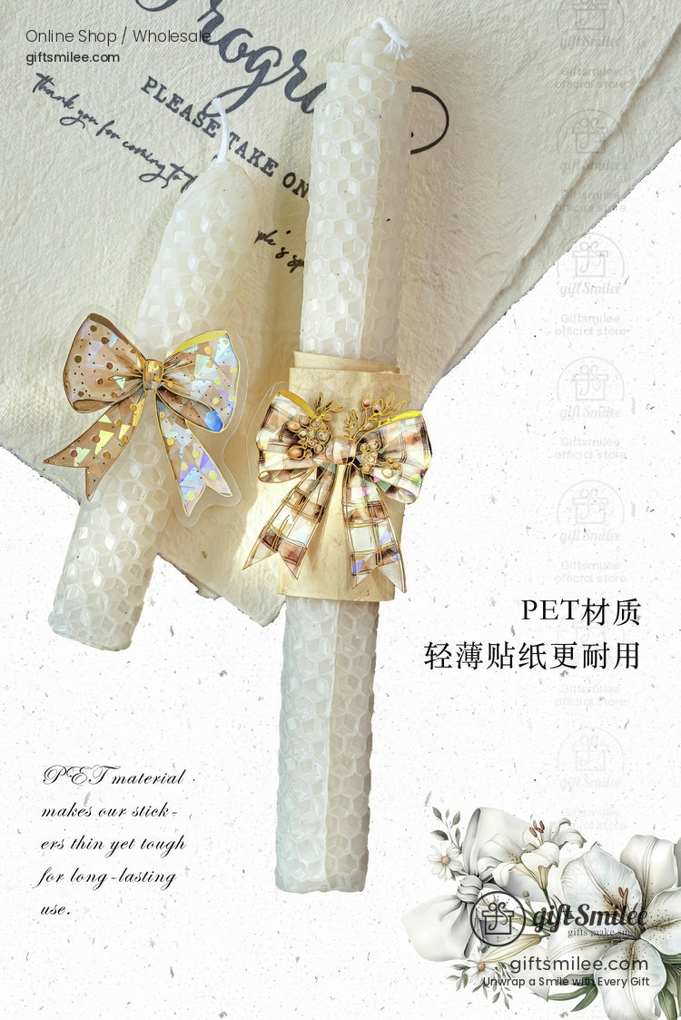 White honeycomb-texture taper candles decorated with iridescent and gold plaid ribbon bows on a neutral background.