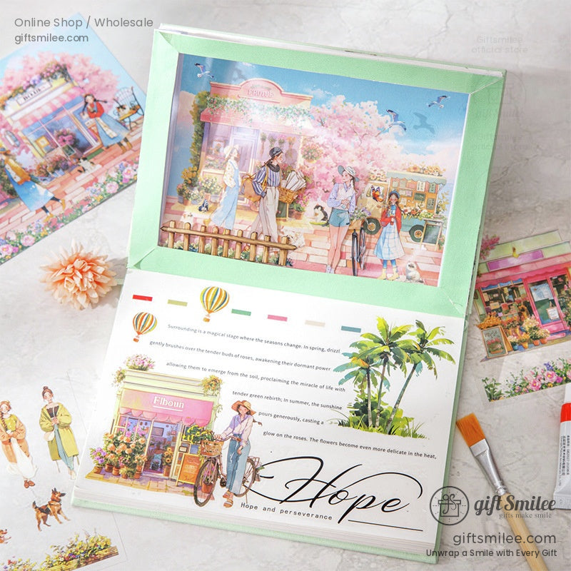 “Floral-themed scrapbook sticker set ‘Hope’ open on table with pastel illustrations of flower shop, hot air balloons, and gardeners – Giftsmilee craft supplies.”