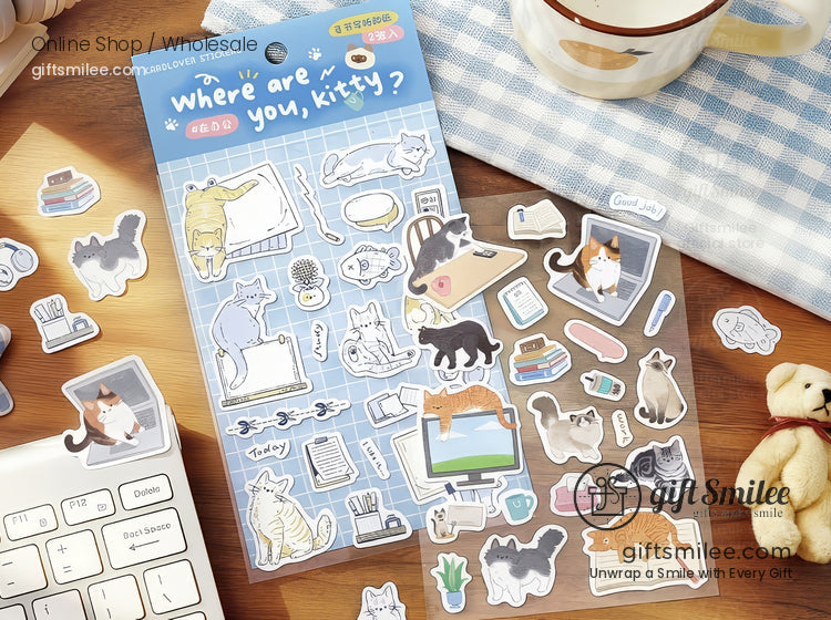 Blue sticker sheet with playful cat illustrations books plants and cozy home items ideal for journaling or crafts