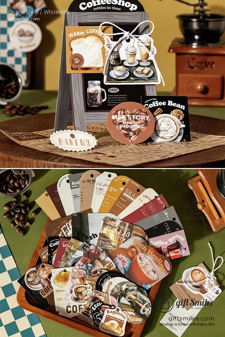 Coffeethemed stationery set with vintage designs featuring warmtoned stickers tags and cards in a wooden tray