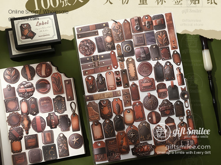 Assorted vintagestyle brown leather sticker set with intricate designs including tags emblems and ornate patterns