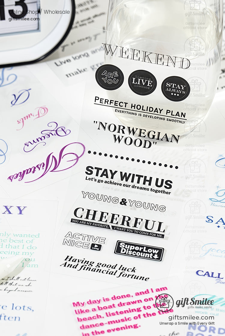 Transparent sticker sheet with various black and colorful typography designs motivational quotes and decorative fonts