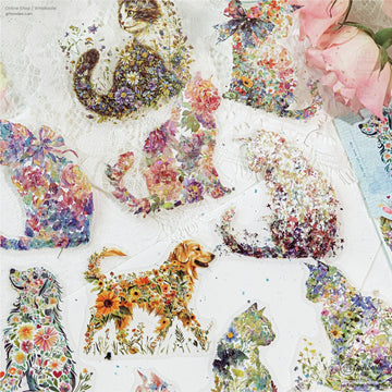 Floral animal stickers featuring vibrant cats and dogs adorned with colorful flowers set on lace with pink roses