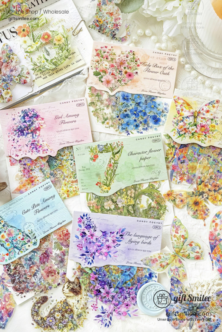 Assorted floralthemed stationery with pastel envelopes botanical illustrations pressed flower stickers and butterfly designs