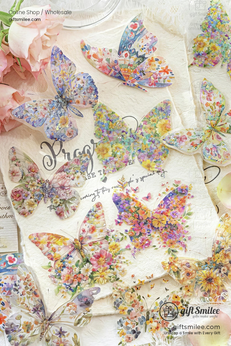 Vibrant floralpatterned butterfly stickers in pastel shades on textured ivory paper surrounded by soft pink roses