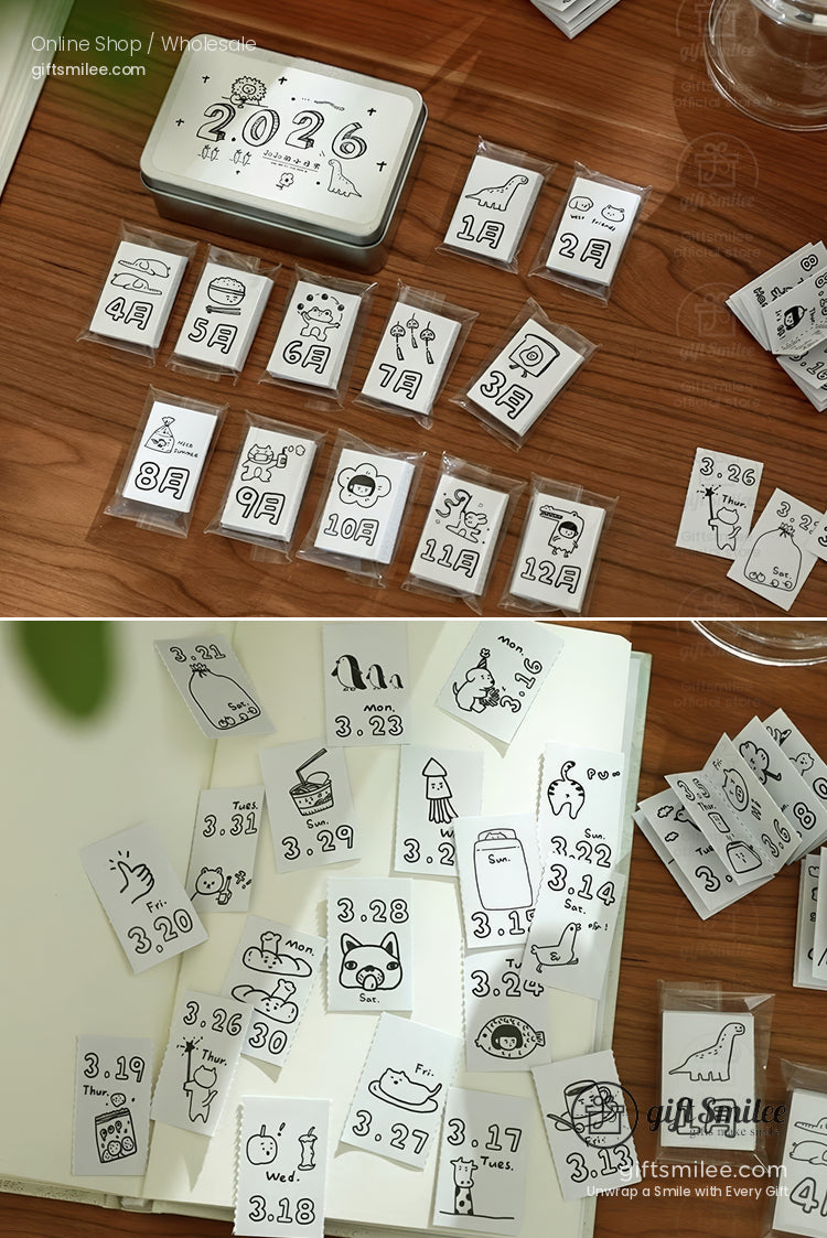 Minimalist 2026 calendar stickers with black doodle designs monthly themes and compact packaging on a wooden surface