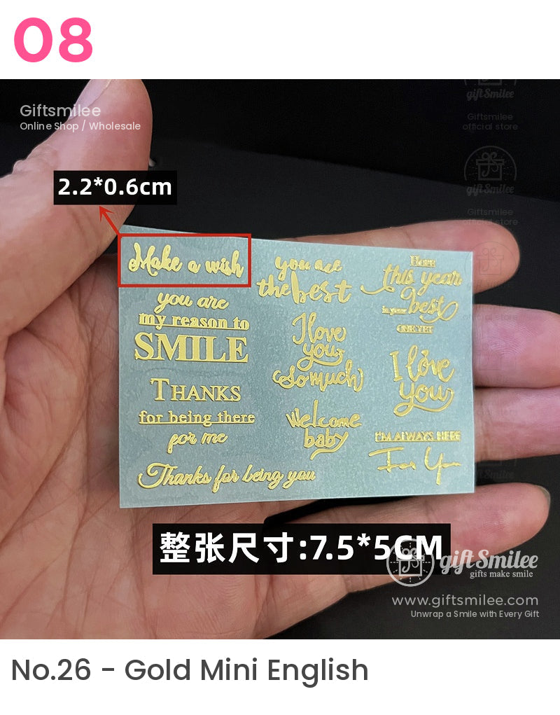 Gold metallic lettering sticker sheet with inspirational phrases on a light blue background measuring 75x5 cm
