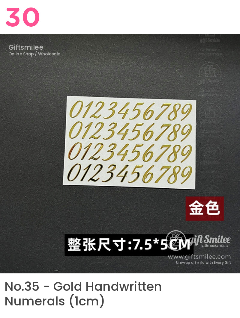 Gold metallic numeral stickers on a white sheet sleek italic font ideal for crafts or decorations 75x5 cm size