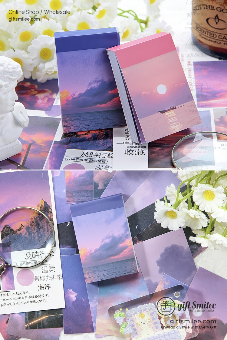 Pastel sunsetthemed notepads with ocean and sky prints complemented by decorative floral details and vibrant accents