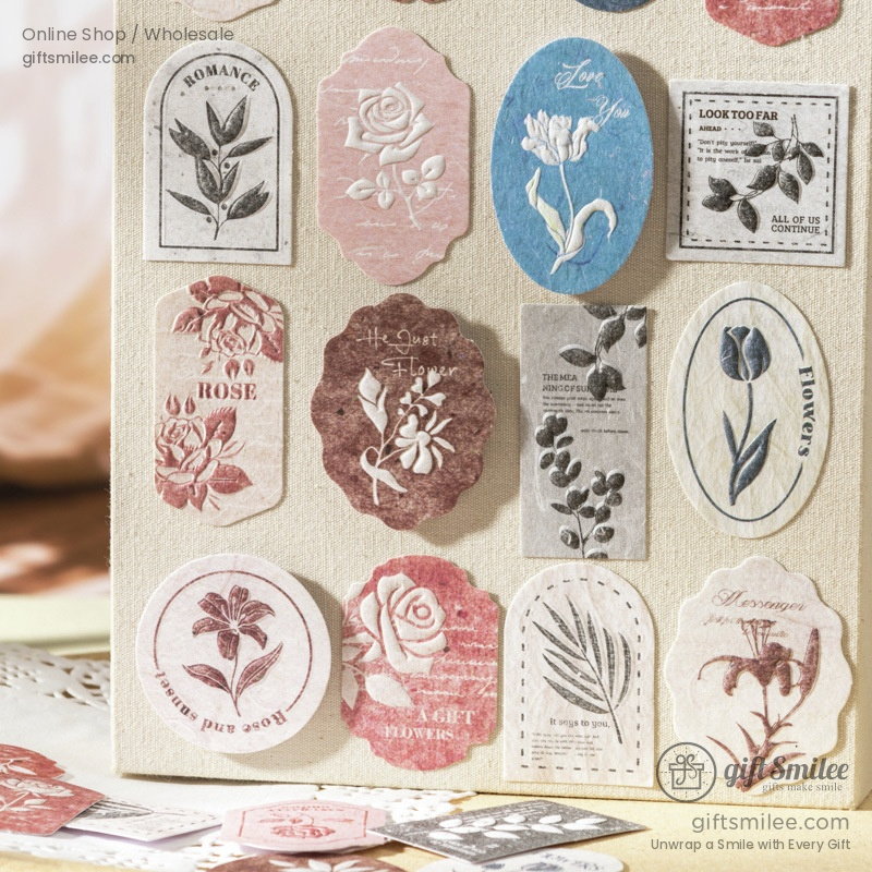 Vintagestyle floral sticker set with rose tulip and botanical illustrations in soft pink blue and beige tones