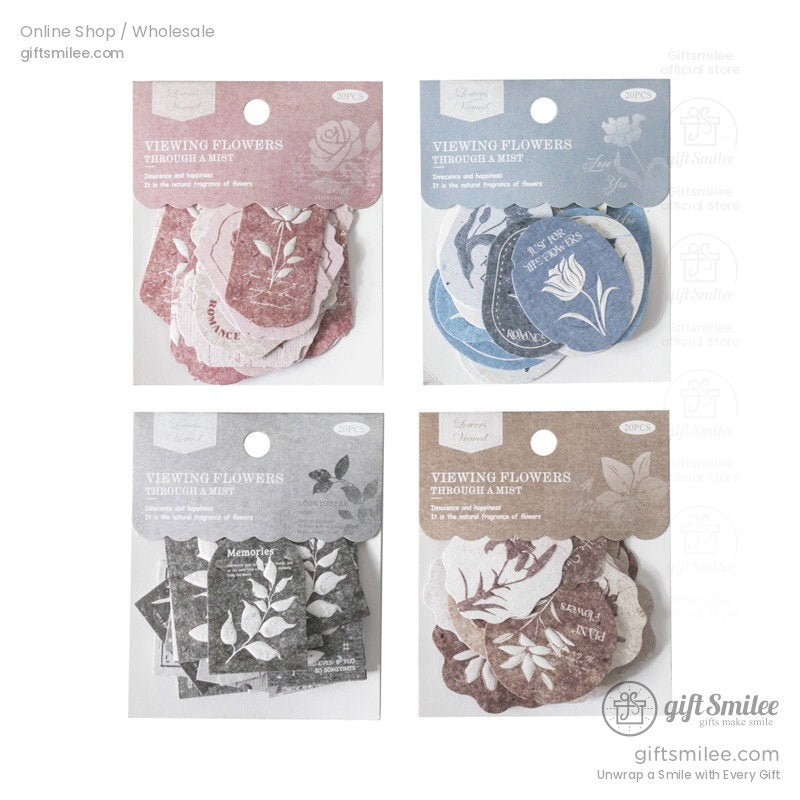 Assorted floraldesigned paper tags in shades of pink blue gray and beige with delicate botanical patterns 20 pieces