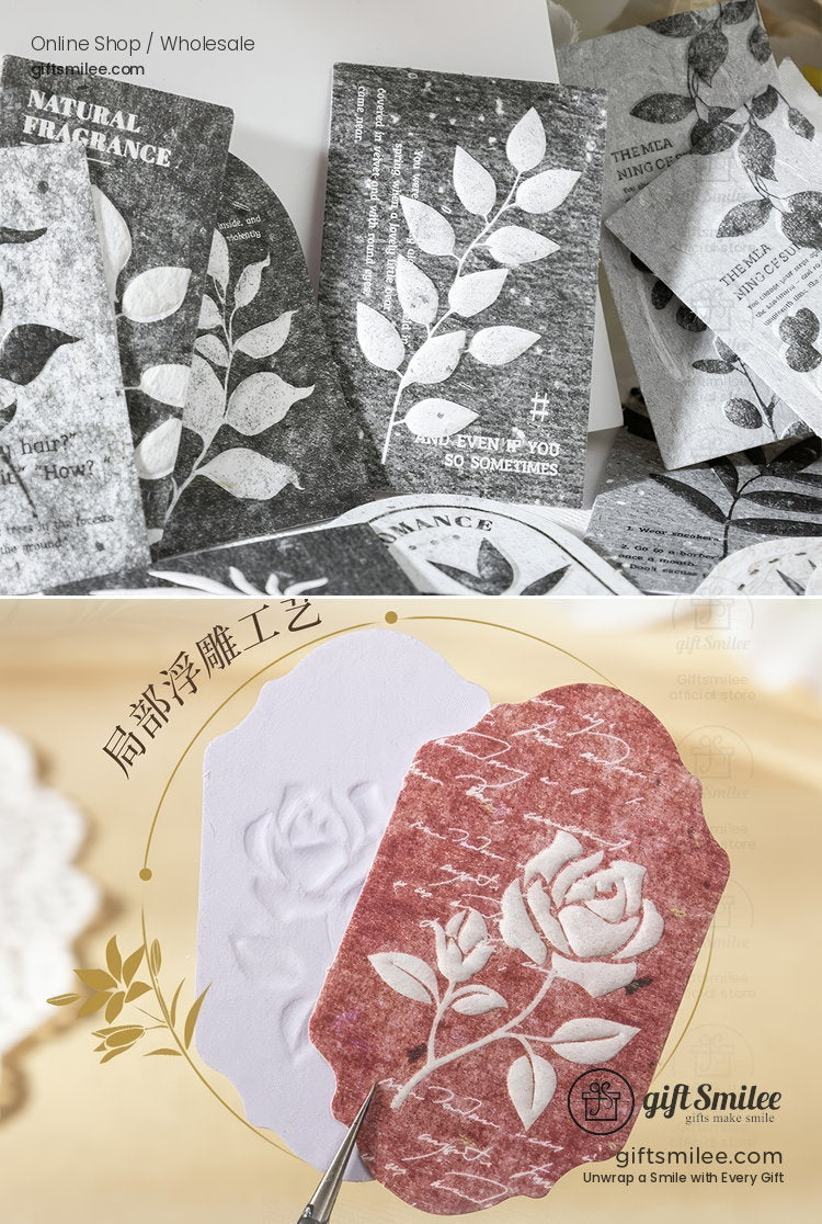 Elegant embossed floral and leafpatterned paper stickers in monochrome and red tones ideal for crafts and journaling