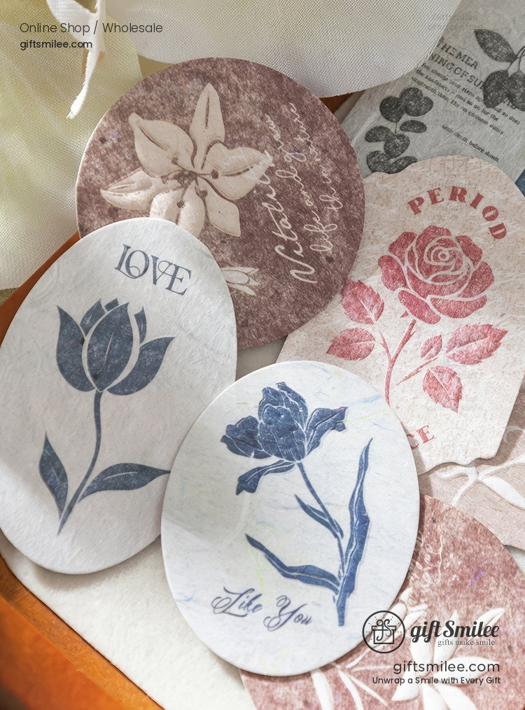 Oval floral paper stickers with vintagestyle pink red and blue rose and tulip designs featuring soft calligraphy
