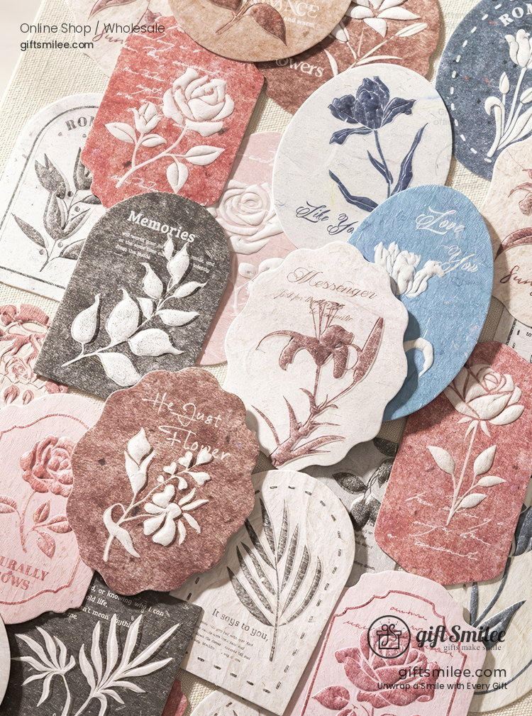 Vintagestyle floral paper stickers in muted pink blue and beige tones showcasing intricate botanical illustrations