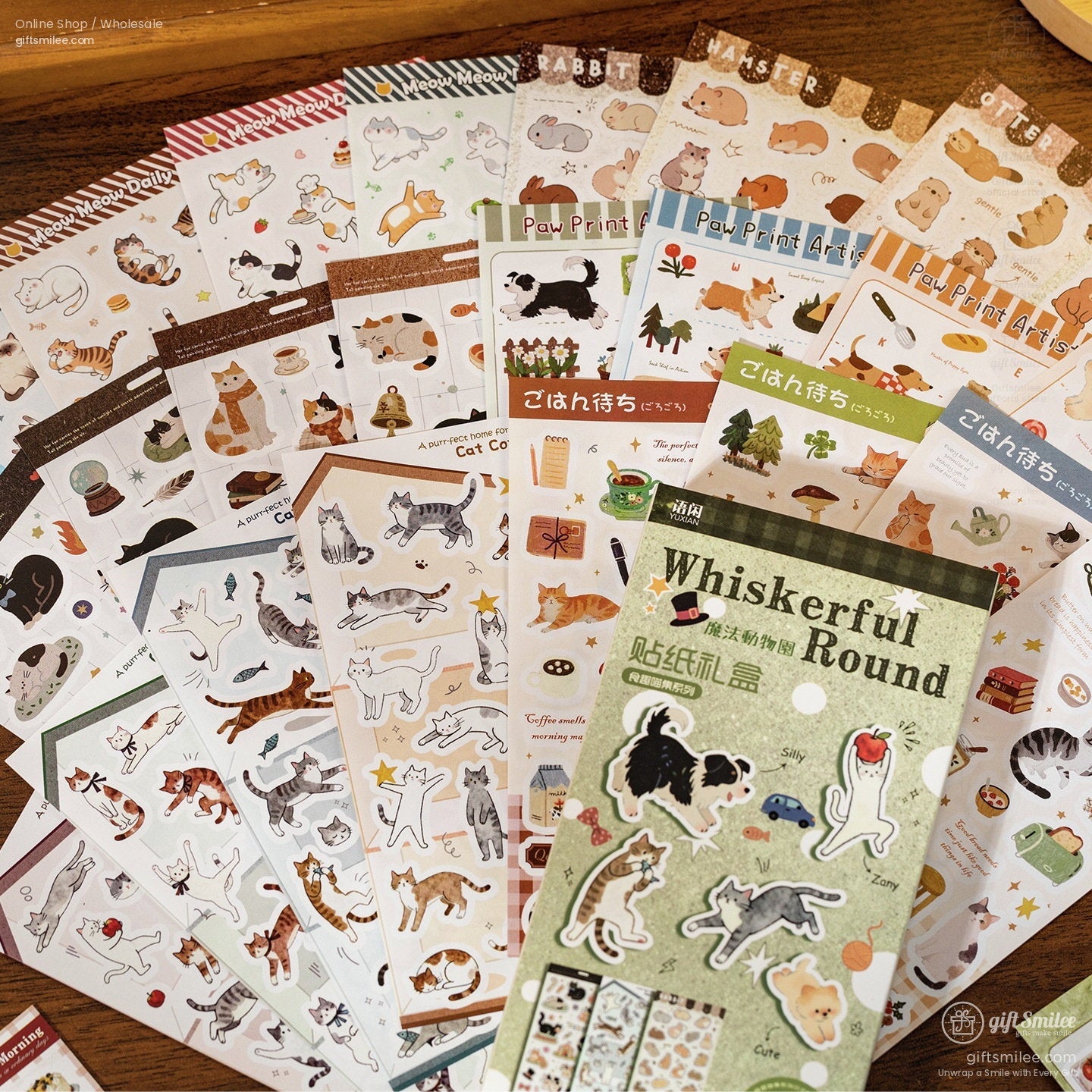 Assorted decorative sticker sheets with playful cat and animal illustrations in colorful whimsical designs