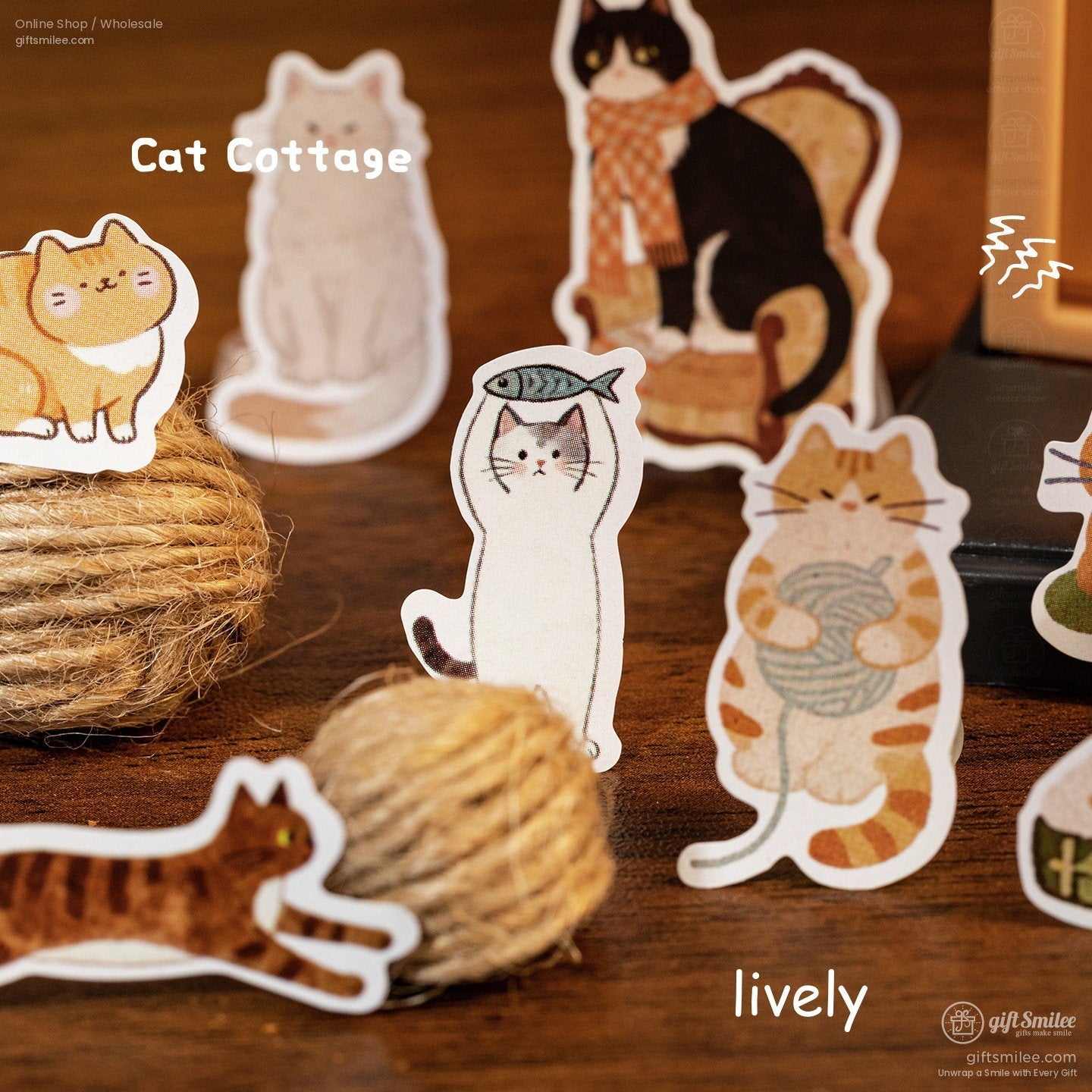 Assorted catthemed paper stickers with playful designs featuring yarn balls fish motifs and cozy brown tones