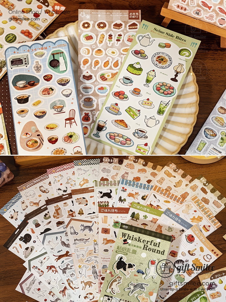 Assorted colorful sticker sheets featuring food dishes kitchen items animals and whimsical designs on a wooden surface