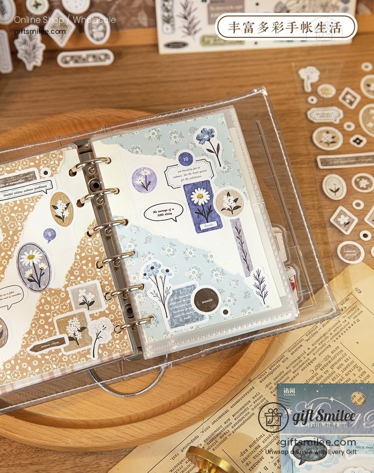 Pasteltoned floral planner with decorative stickers transparent ring binder and delicate botanical patterns