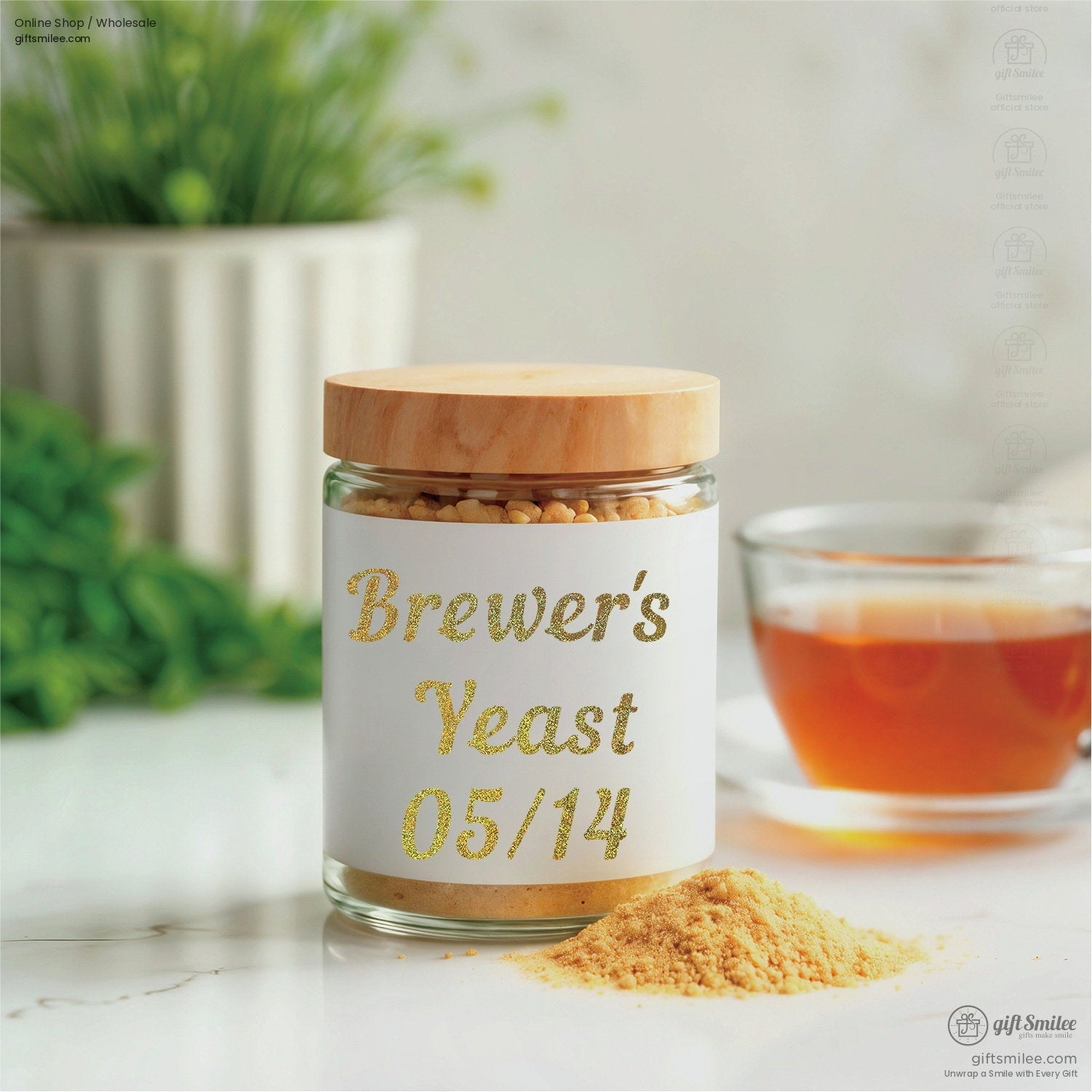 Clear glass jar with wooden lid labeled Brewers Yeast 0514 filled with golden granules on marble countertop