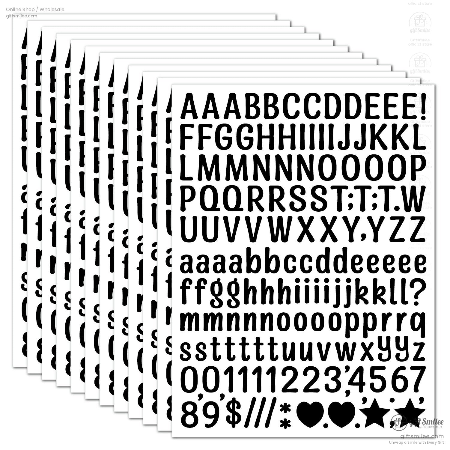 Black vinyl alphabet and number stickers with uppercase lowercase symbols and punctuation on white rectangular sheets