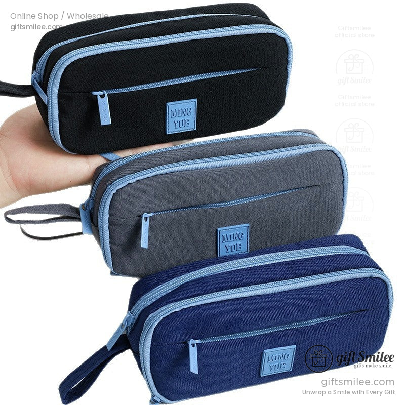 All three colors of the pencil case (black, gray, blue) displayed together
