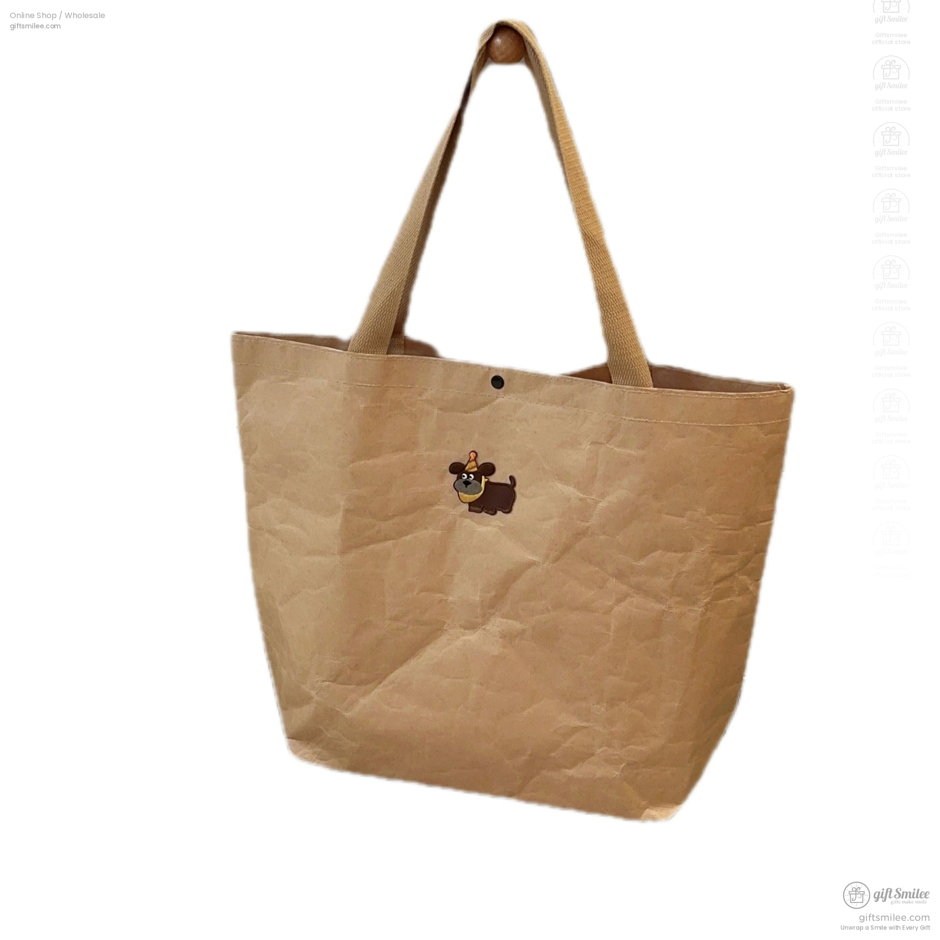 Light brown paper tote bag with reinforced handles and a playful cartoon dog design wearing a yellow party hat